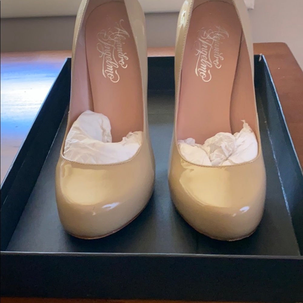 Beige patent pumps